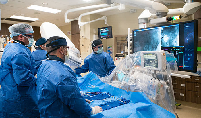 Guillherme Attizzani, MD during interventional cardiology procedure.