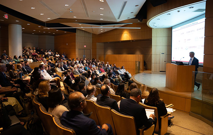 Dan Simon, MD addresses full room during 2024 State of UH Research Address