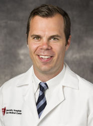 James E. Voos, MD