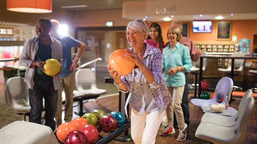 group of people bowling